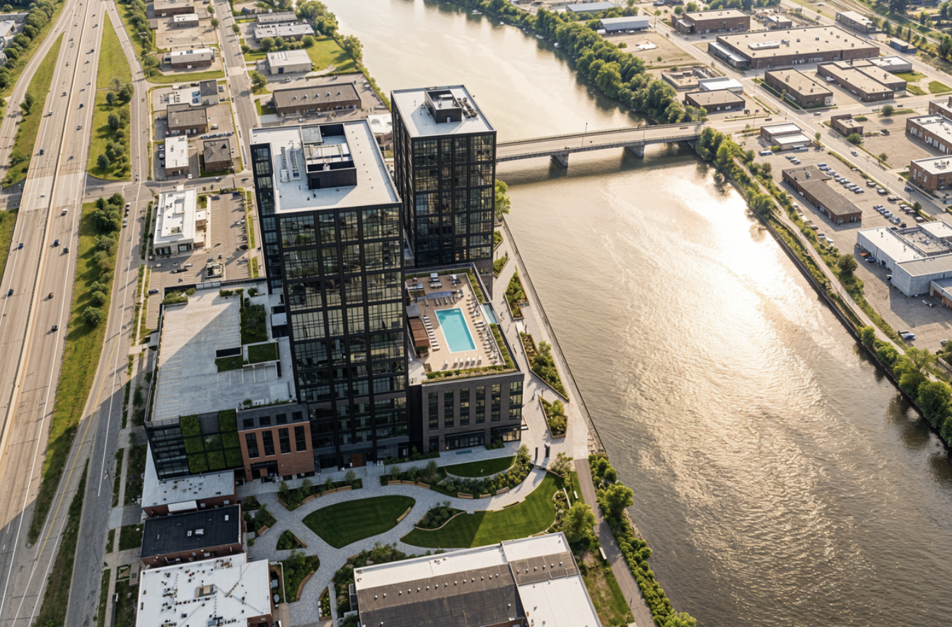 Aerial view of a riverfront mixed-use development